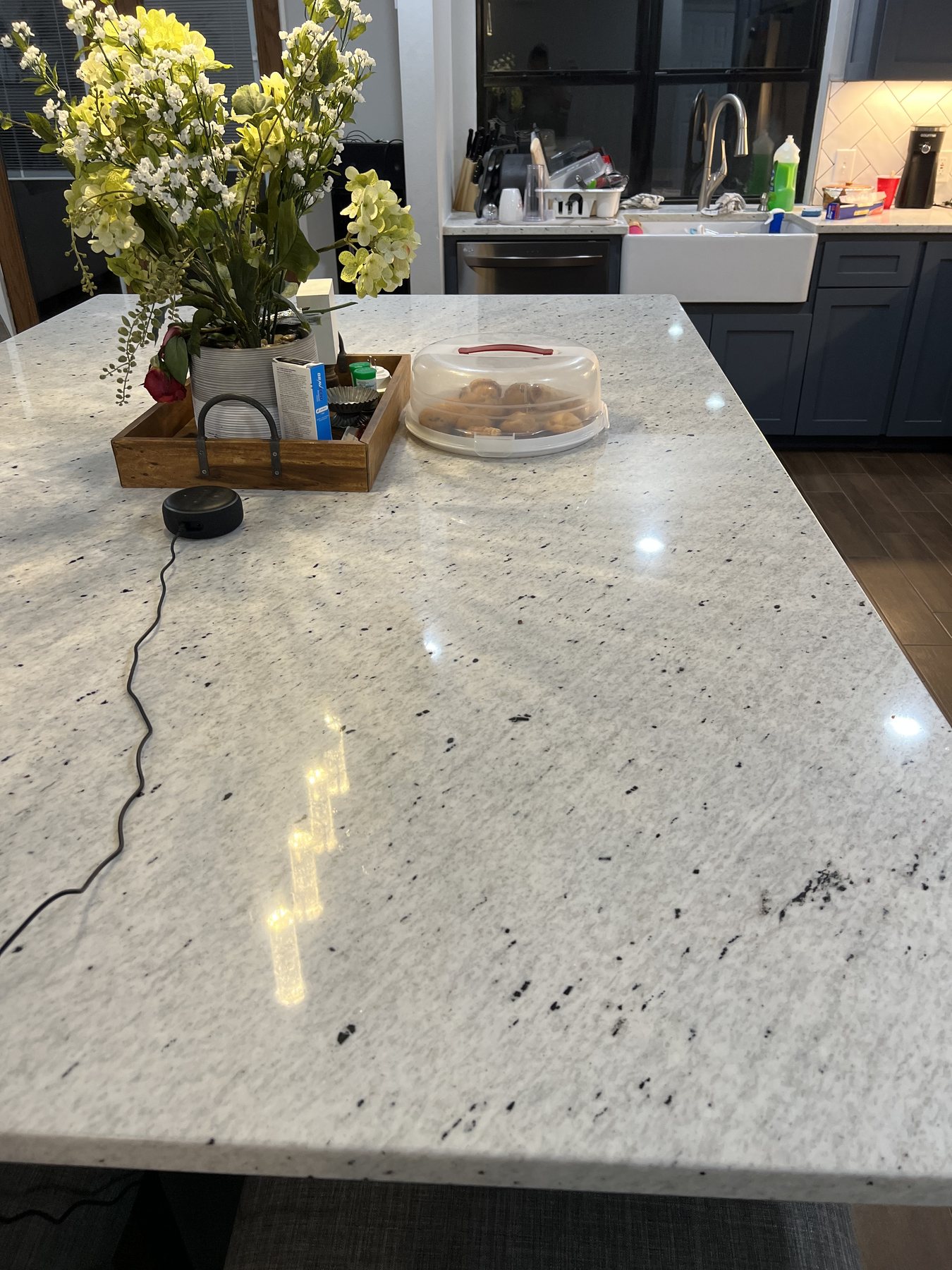 Close detail of the finished stone countertop and island surface
