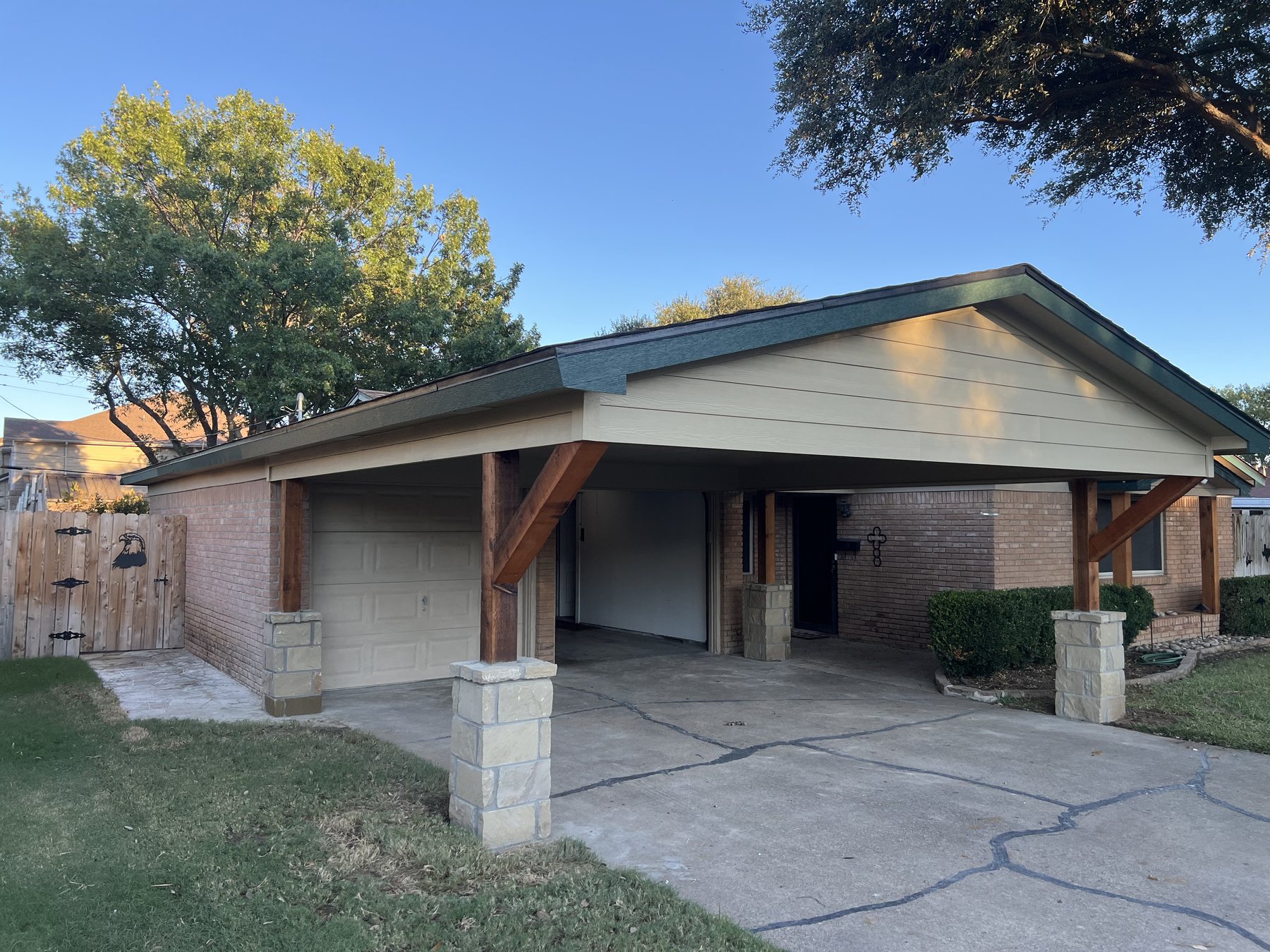 Closer view of the finished carport with roofline and column supports