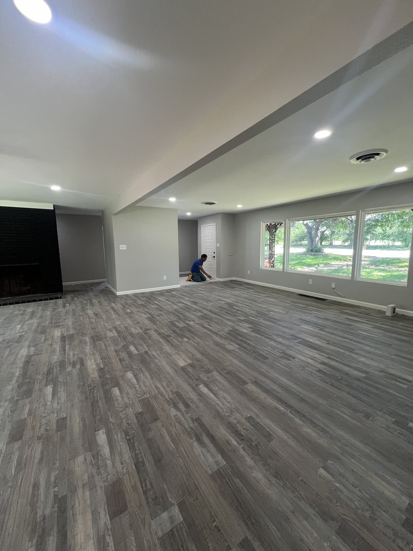 Finished interior flooring installation in an open living area